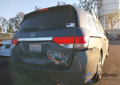 2014 Honda Odyssey Lx z USA, uszkodzony, nr VIN 5FNRL5H26EB047155